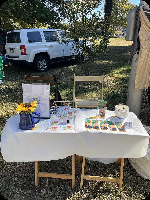 The stall set up at an outdoor fair.