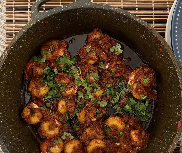 Masala prawns with coriander.